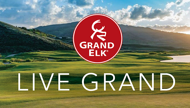 LIVE GRAND on mountain golf course backdrop